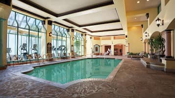 Indoor pool, open 6:00 AM to 11:00 PM, pool loungers