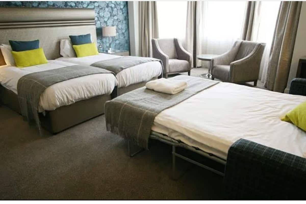 Family Room, Multiple Beds, Non Smoking (Converts to 2 Twin Beds) | Desk, iron/ironing board, free WiFi, bed sheets