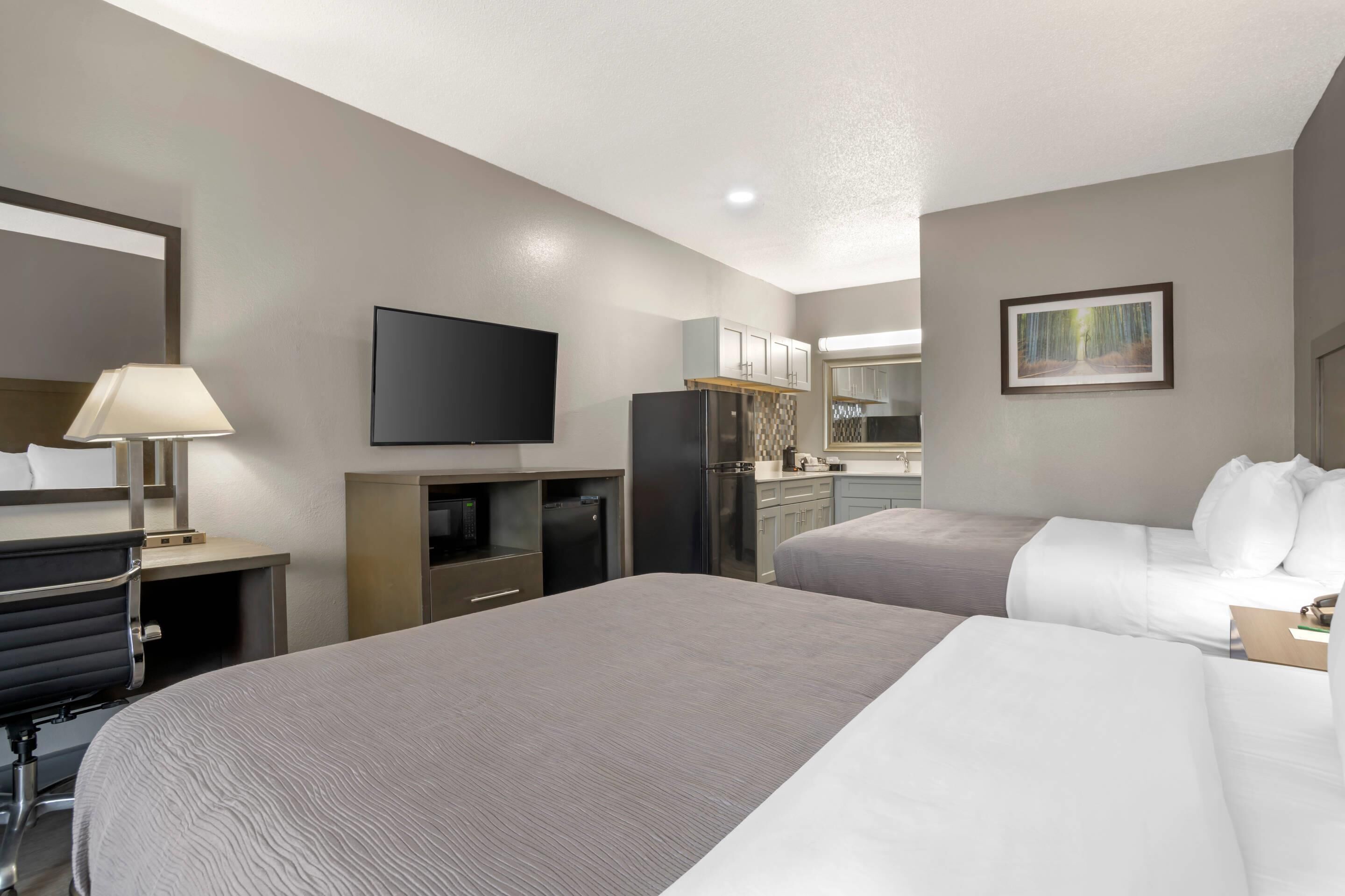 Room, 2 Queen Beds, Non Smoking (Upgrade) | Desk, laptop workspace, iron/ironing board, free WiFi