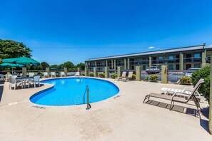 Seasonal outdoor pool, open 9 AM to 10:00 PM, pool loungers