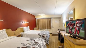 Escritorio, cortinas blackout, cunas gratuitas y wifi gratis