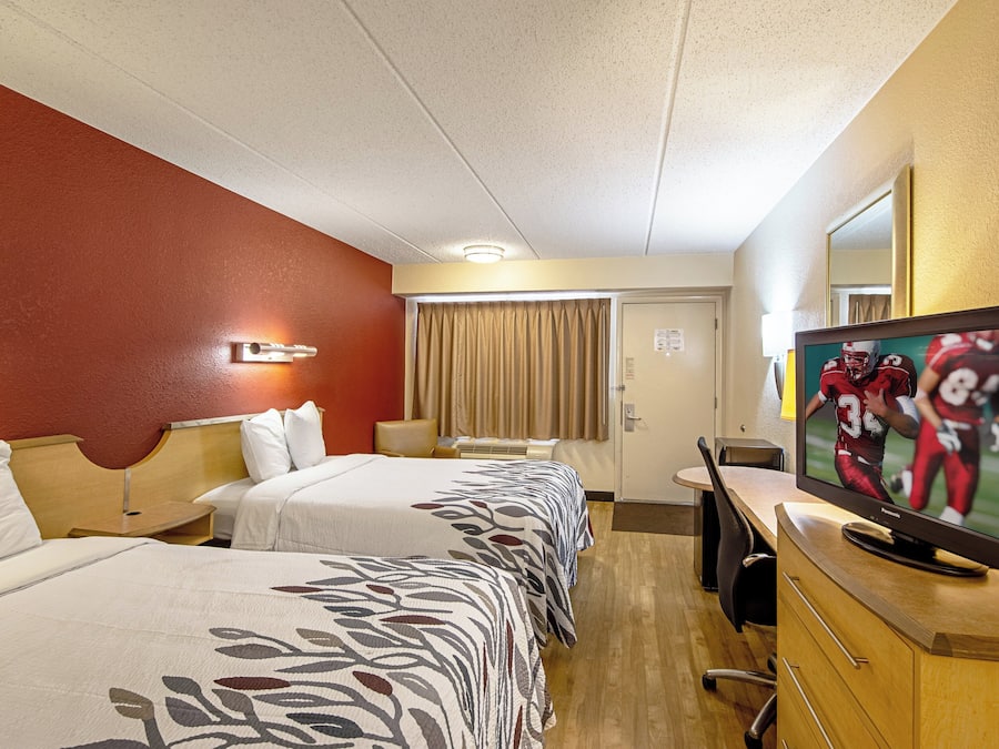 Desk, blackout drapes, cribs (free), WiFi (free)
