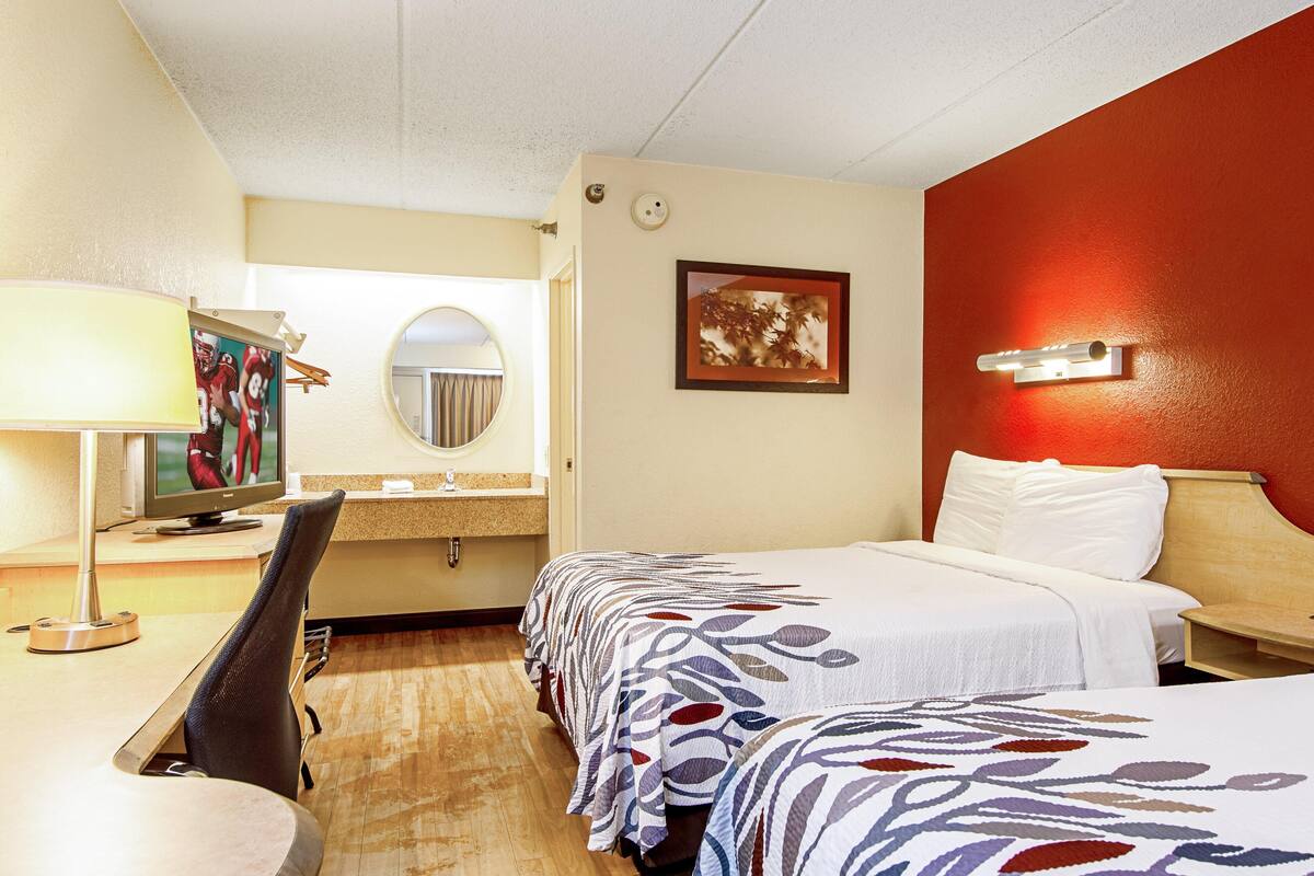 Desk, blackout curtains, free cots/infant beds, free WiFi