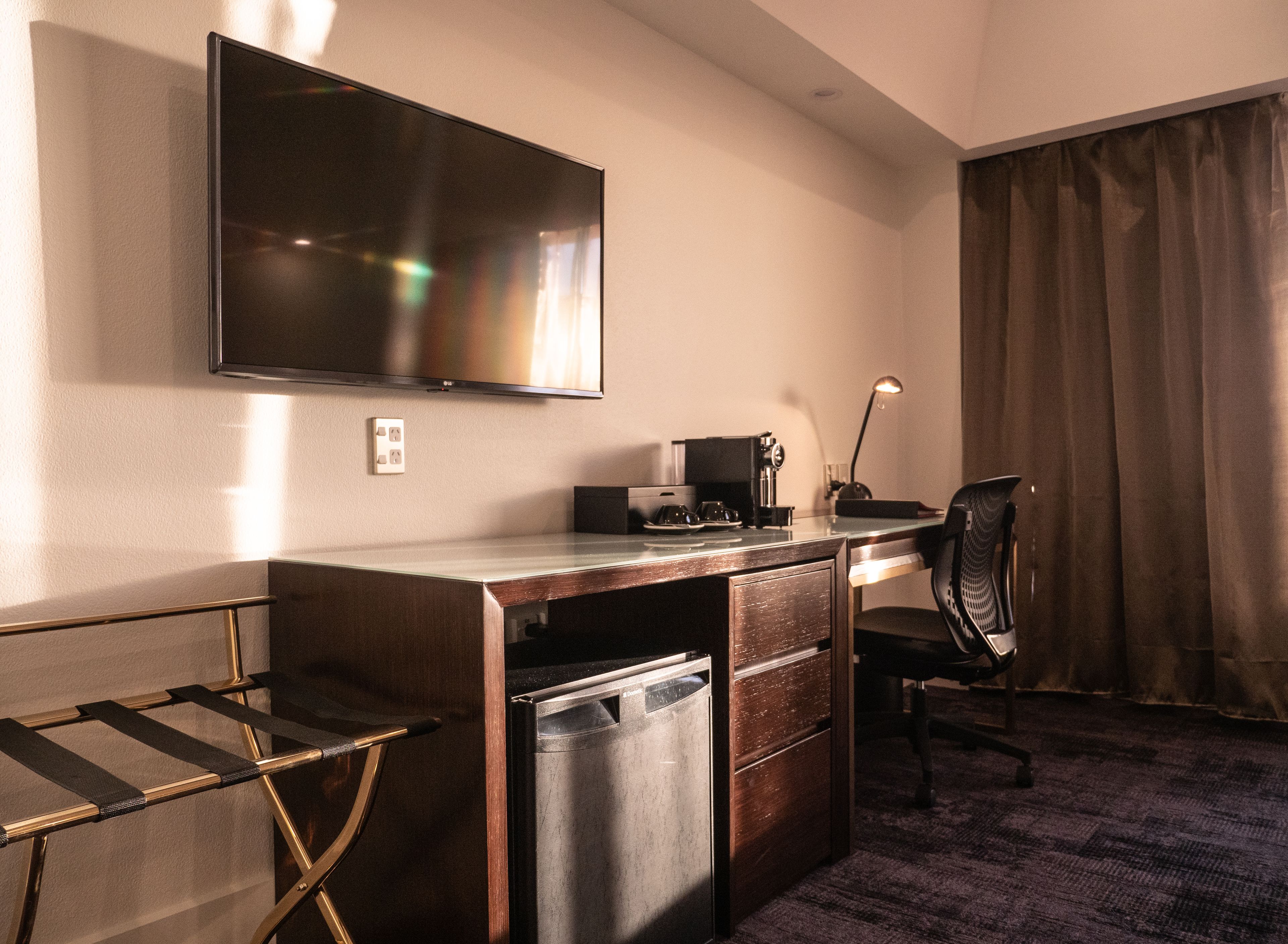 desk, laptop workspace, blackout curtains, iron/ironing board