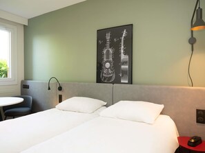 Standardzimmer, 2 Einzelbetten | Hochwertige Bettwaren, individuell eingerichtet, Schreibtisch