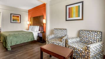 Desk, laptop workspace, blackout drapes, iron/ironing board