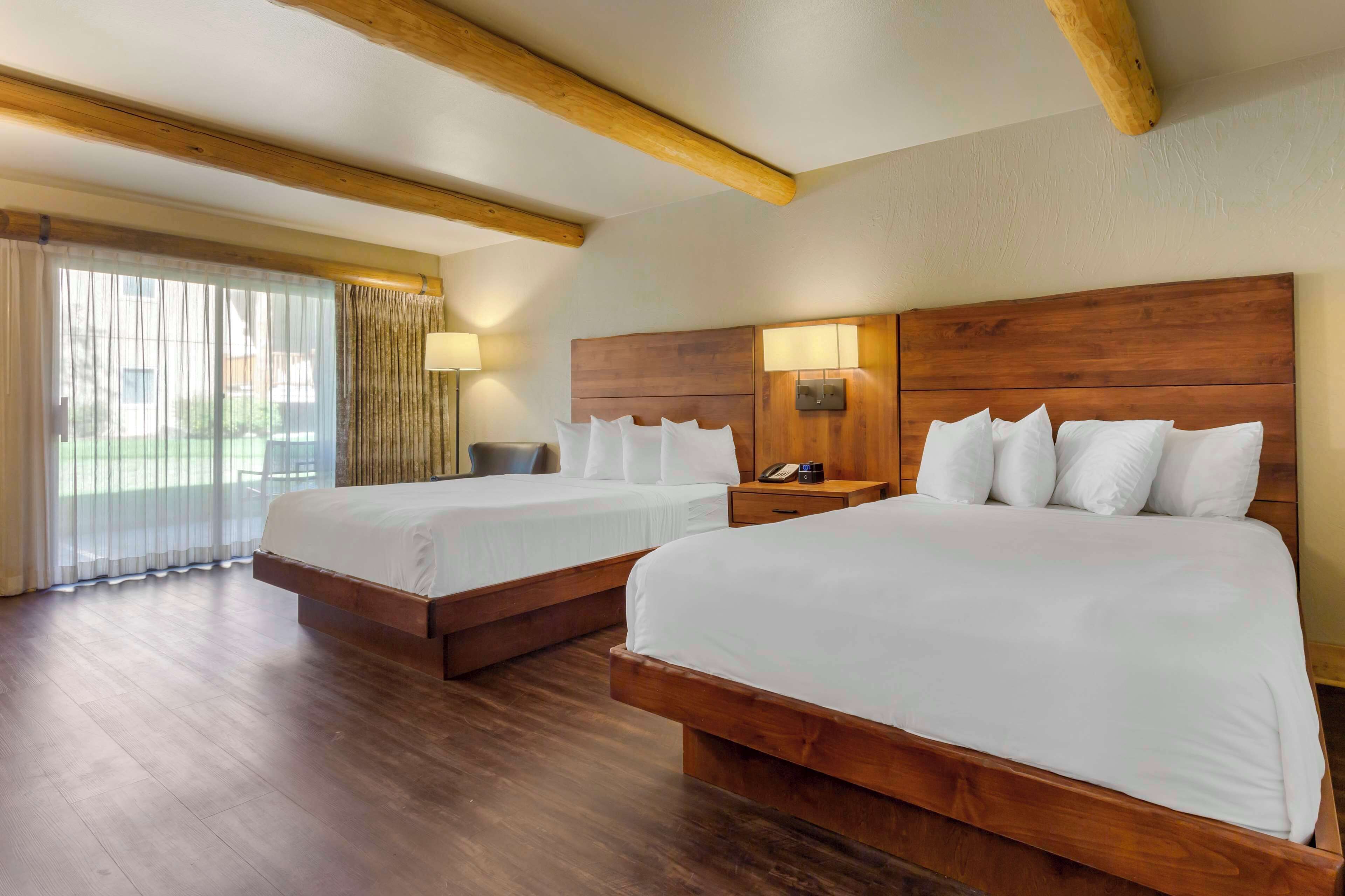 laptop workspace, blackout curtains, iron/ironing board