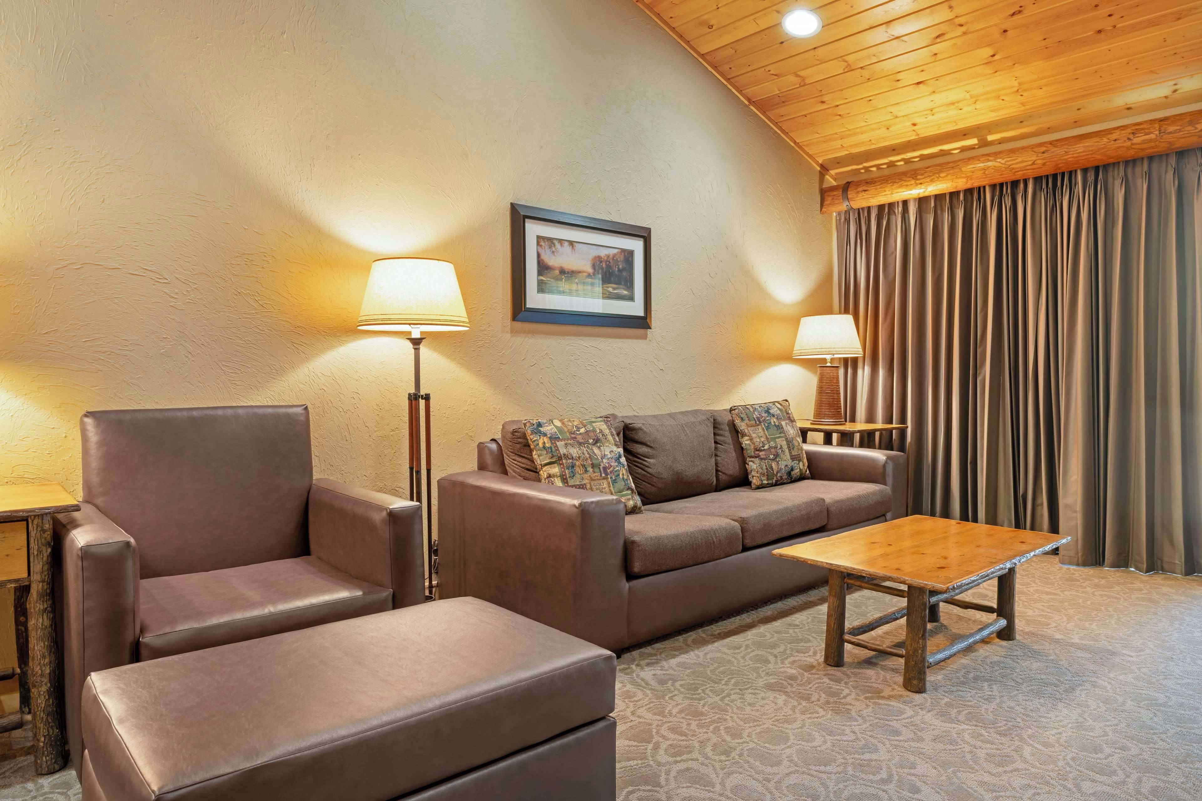 suite, 1 king bed, non smoking, jetted tub (with sofabed;no pets in room type) | laptop workspace, blackout curtains, iron/ironing board