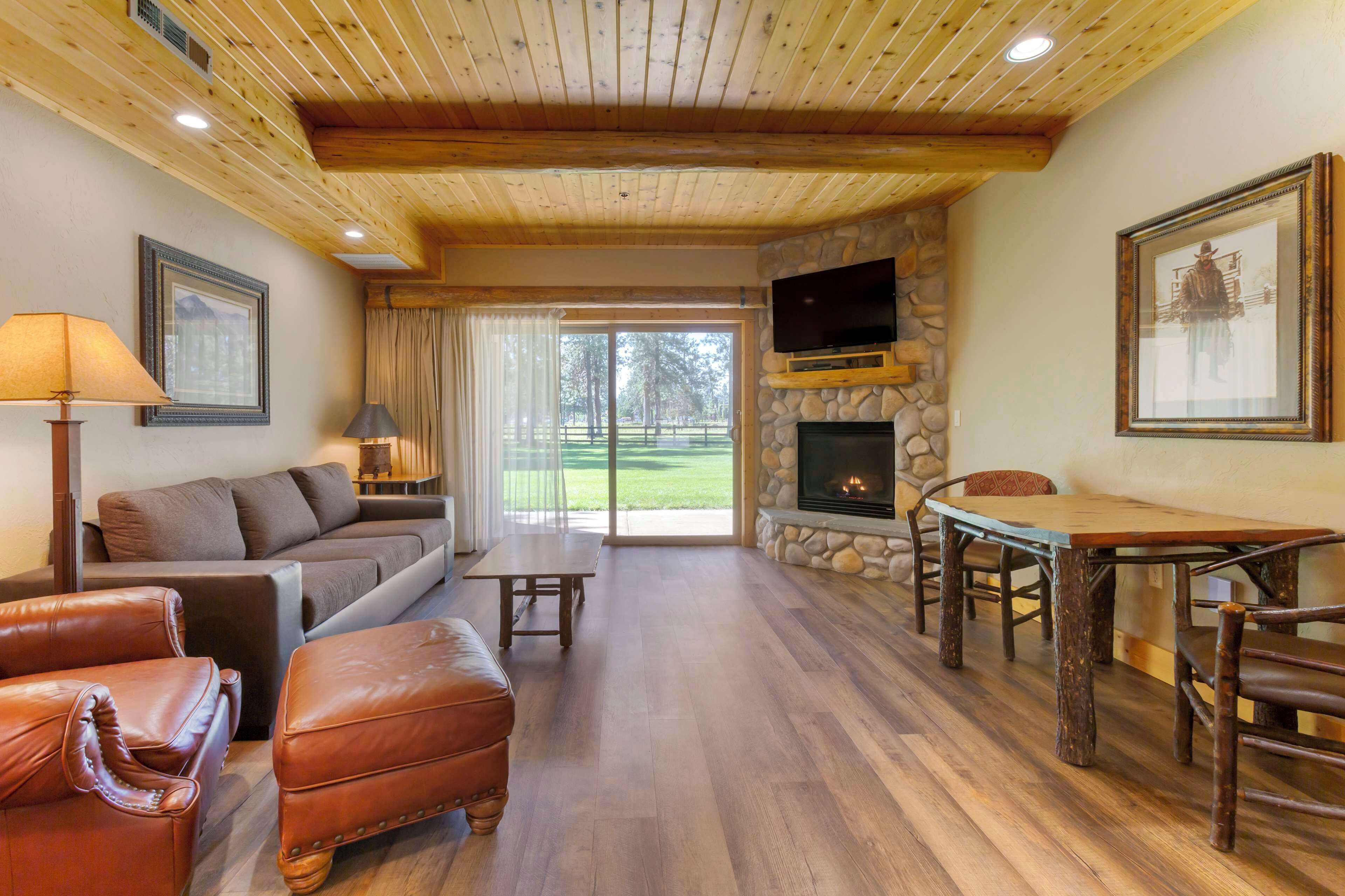 Suite, 1 King Bed, Non Smoking, Jetted Tub (Pet Friendly;with Sofabed) | Laptop workspace, blackout curtains, iron/ironing board