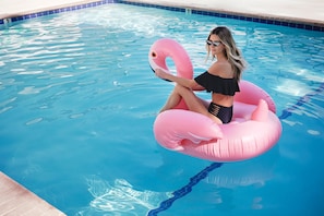 Outdoor pool, open 10:00 AM to 10:00 PM, pool umbrellas, sun loungers