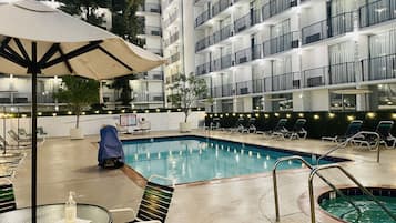 Outdoor pool, open 10:00 AM to 10:00 PM, pool umbrellas, sun loungers