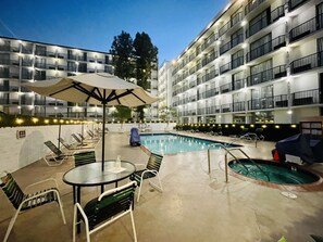 Outdoor pool, open 10:00 AM to 10:00 PM, pool umbrellas, sun loungers