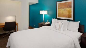 Premium bedding, pillowtop beds, desk, laptop workspace