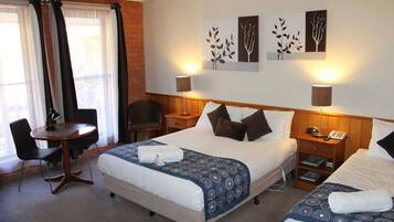 Standard Triple Room | Minibar, desk, iron/ironing board, free WiFi