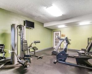 A gym with exercise equipment including a treadmill, elliptical, and weight machines. - Quality Inn & Suites Ridgeland (Ridgeland)