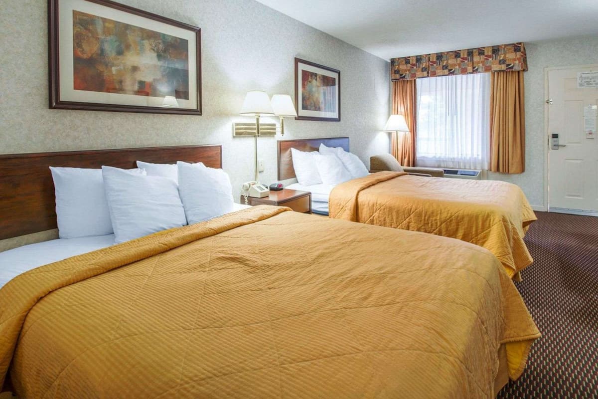 Standard Room, 2 Queen Beds, Non Smoking | In-room safe, desk, iron/ironing board, rollaway beds