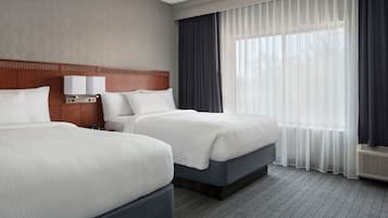 Suite, 2 Double Beds, Non Smoking | Premium bedding, desk, laptop workspace, iron/ironing board