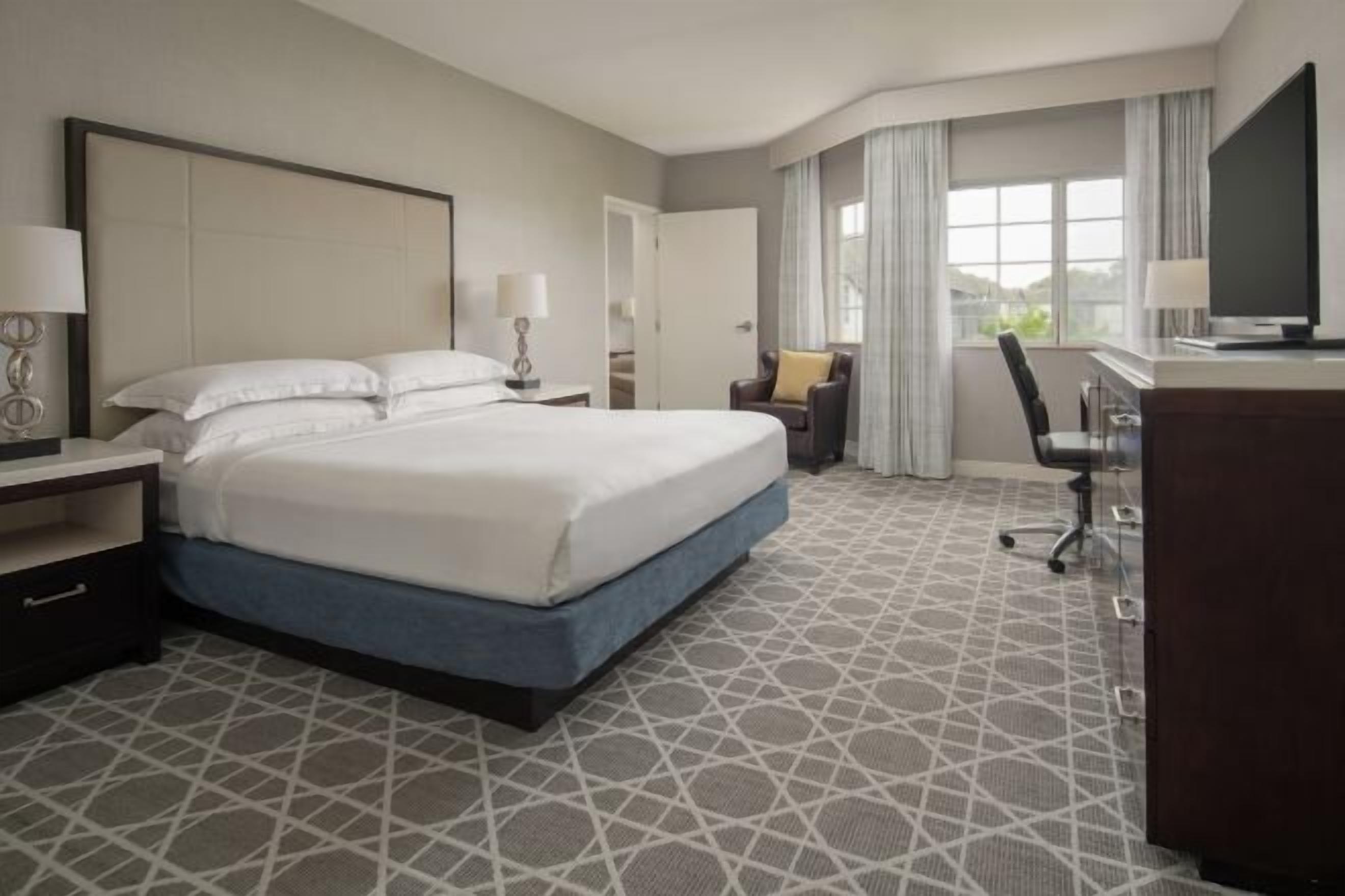 Premium bedding, down comforters, in-room safe, desk