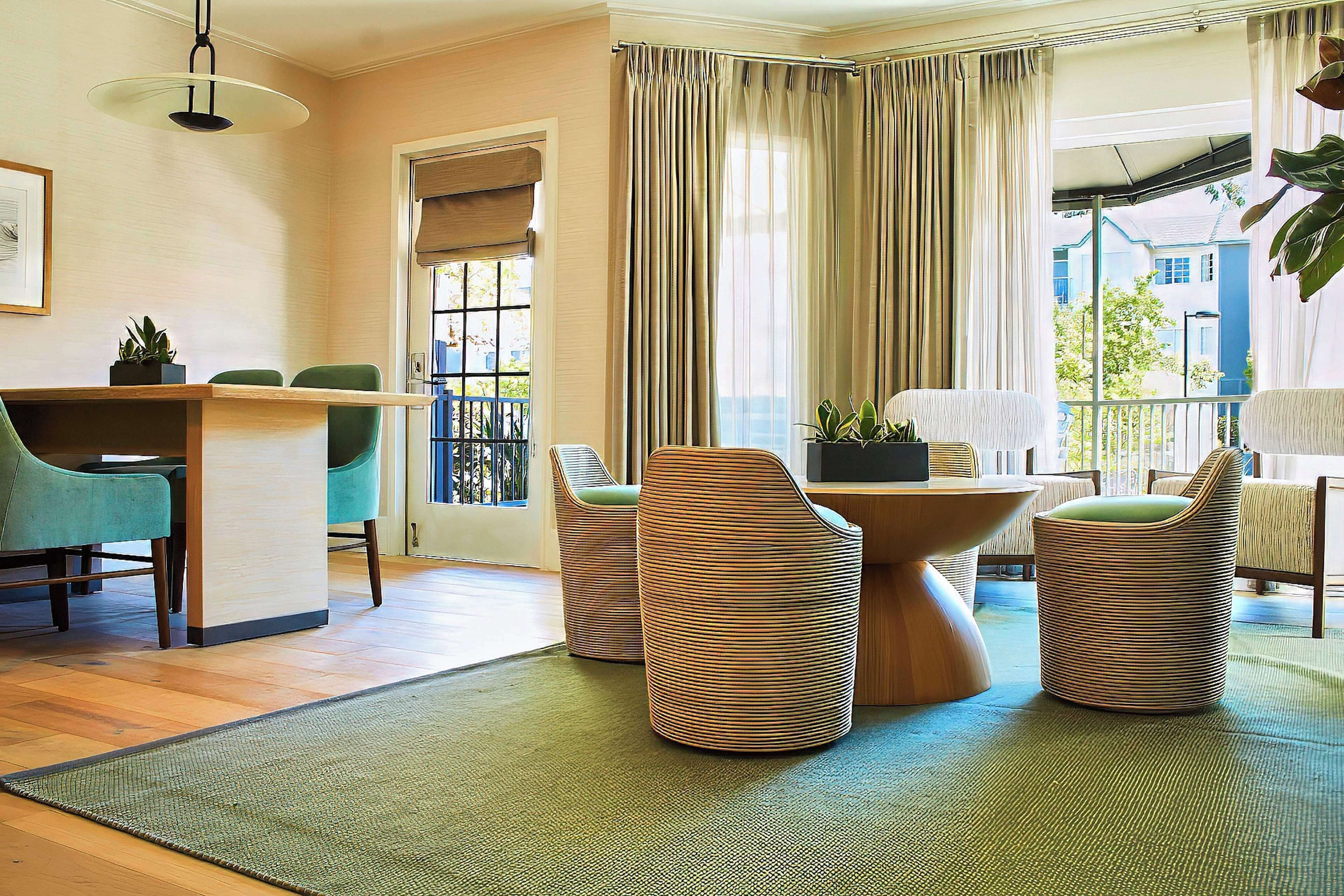 suite, 1 king bed, patio | living area | 55-inch flat-screen tv with cable channels, smart tv