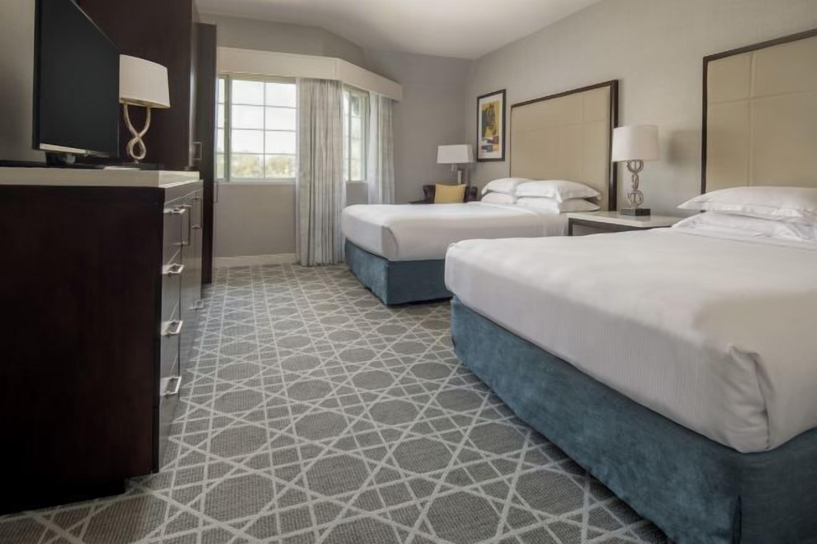 Premium bedding, down comforters, in-room safe, desk