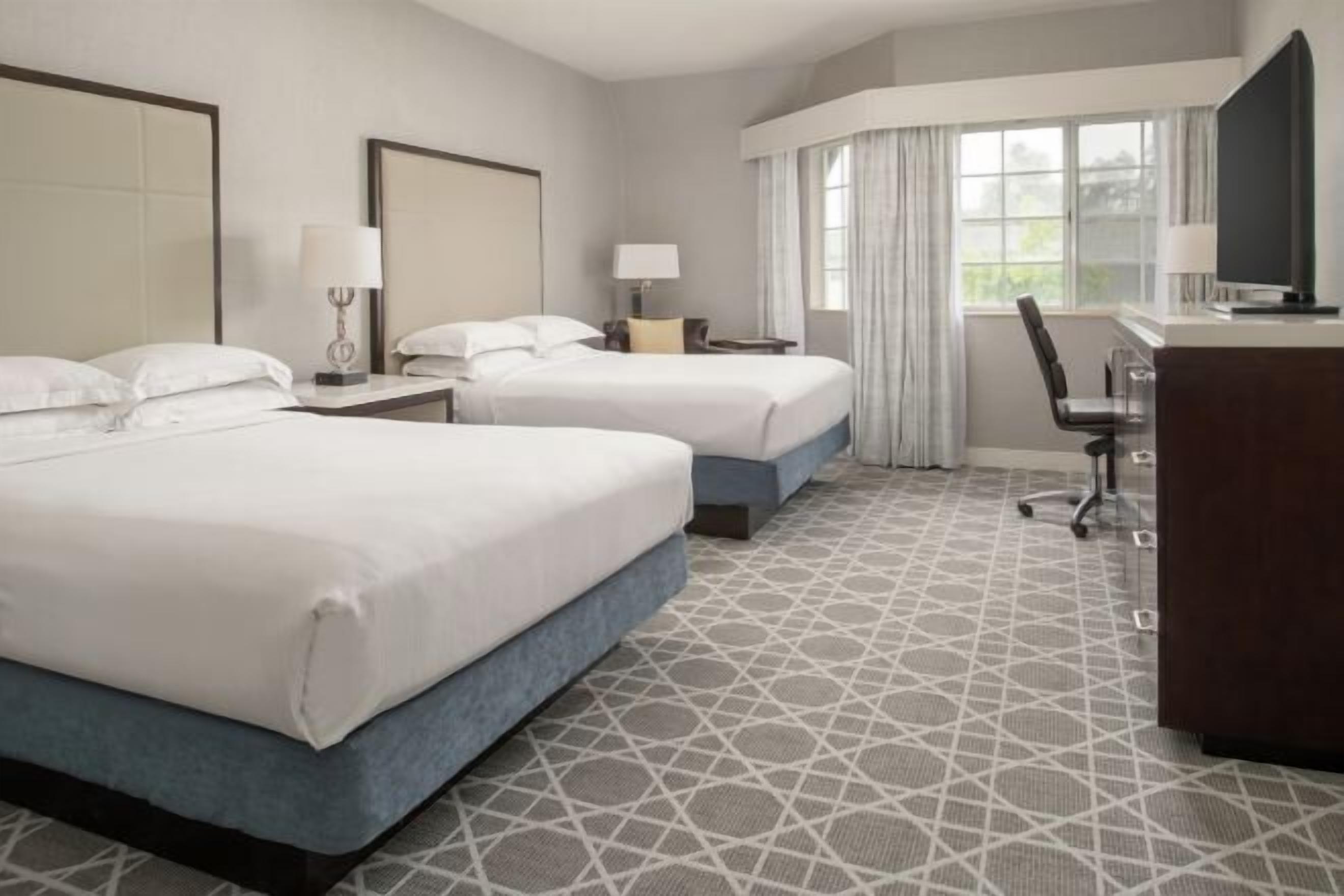 Premium bedding, down comforters, in-room safe, desk