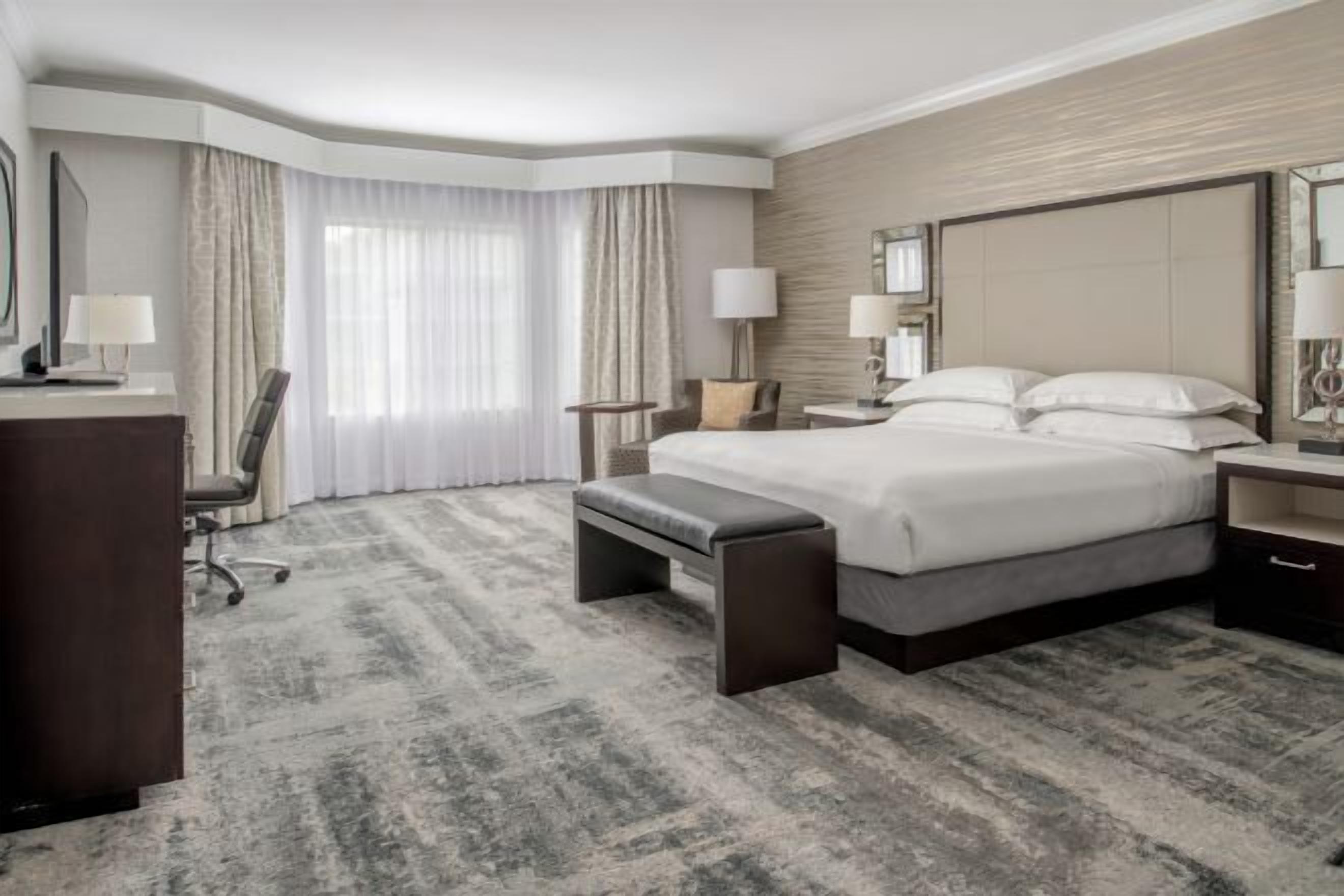 Premium bedding, down comforters, in-room safe, desk