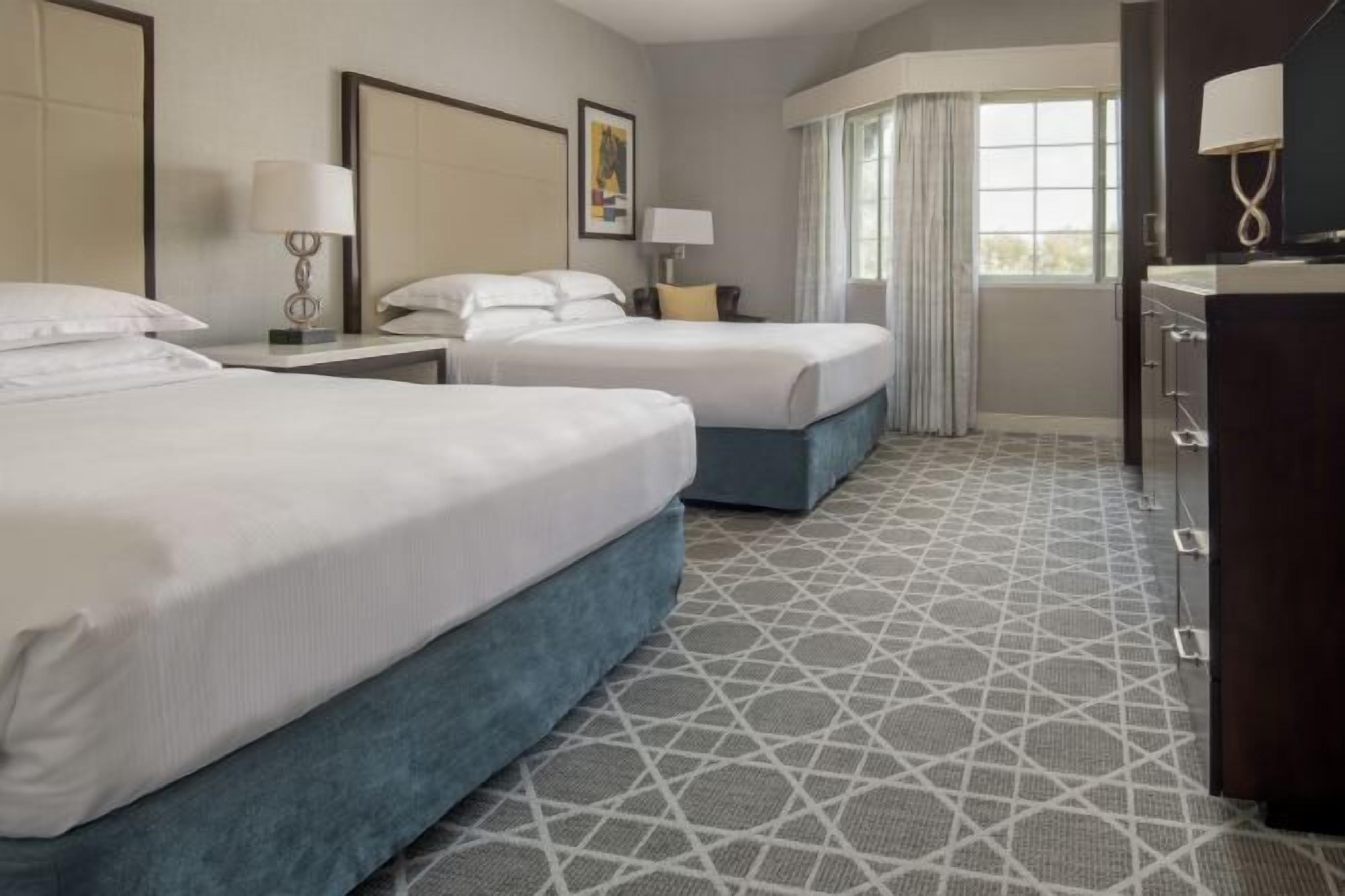 Premium bedding, down comforters, in-room safe, desk