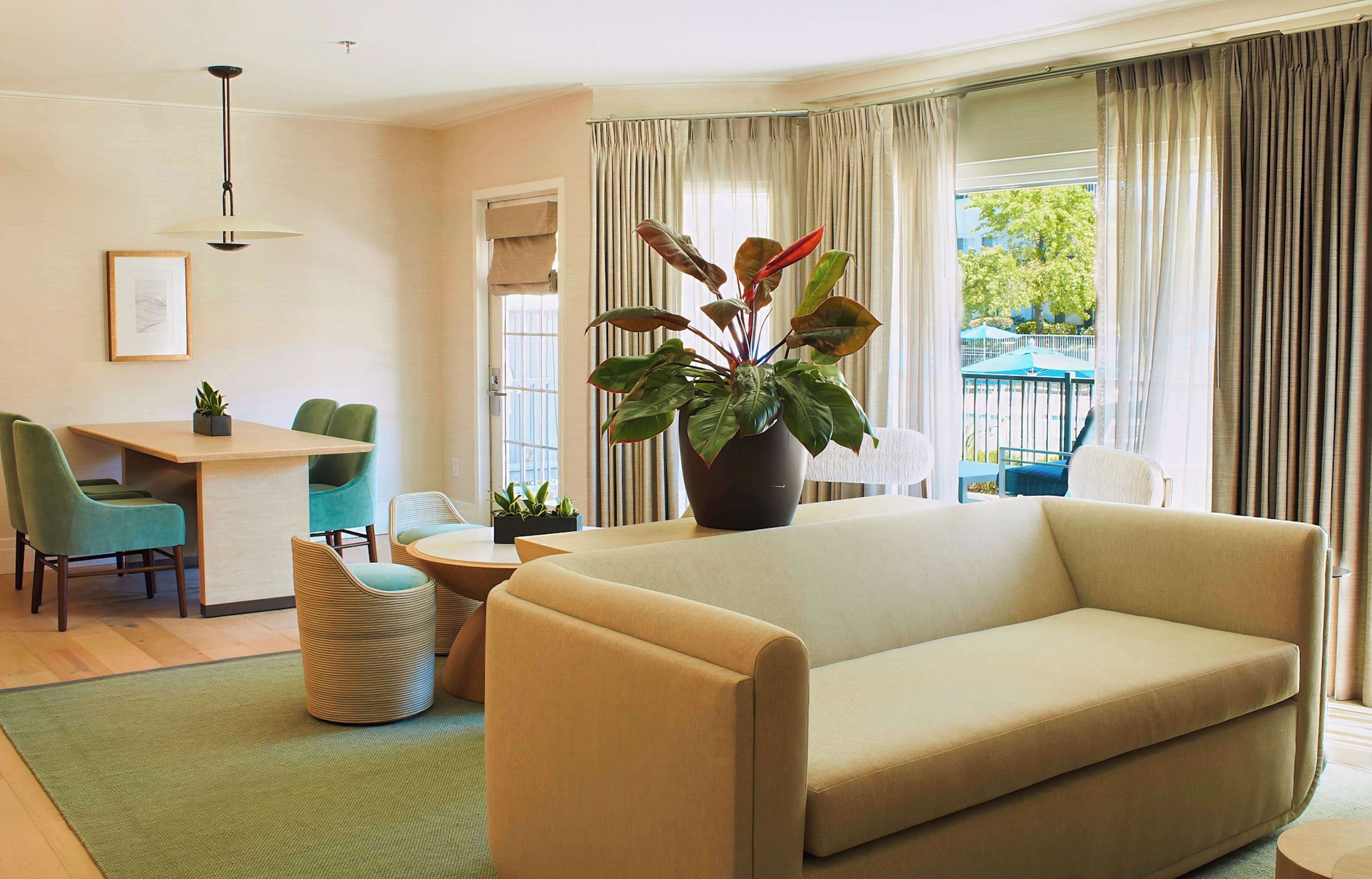 suite, 1 king bed, patio | living area | 55-inch flat-screen tv with cable channels, smart tv