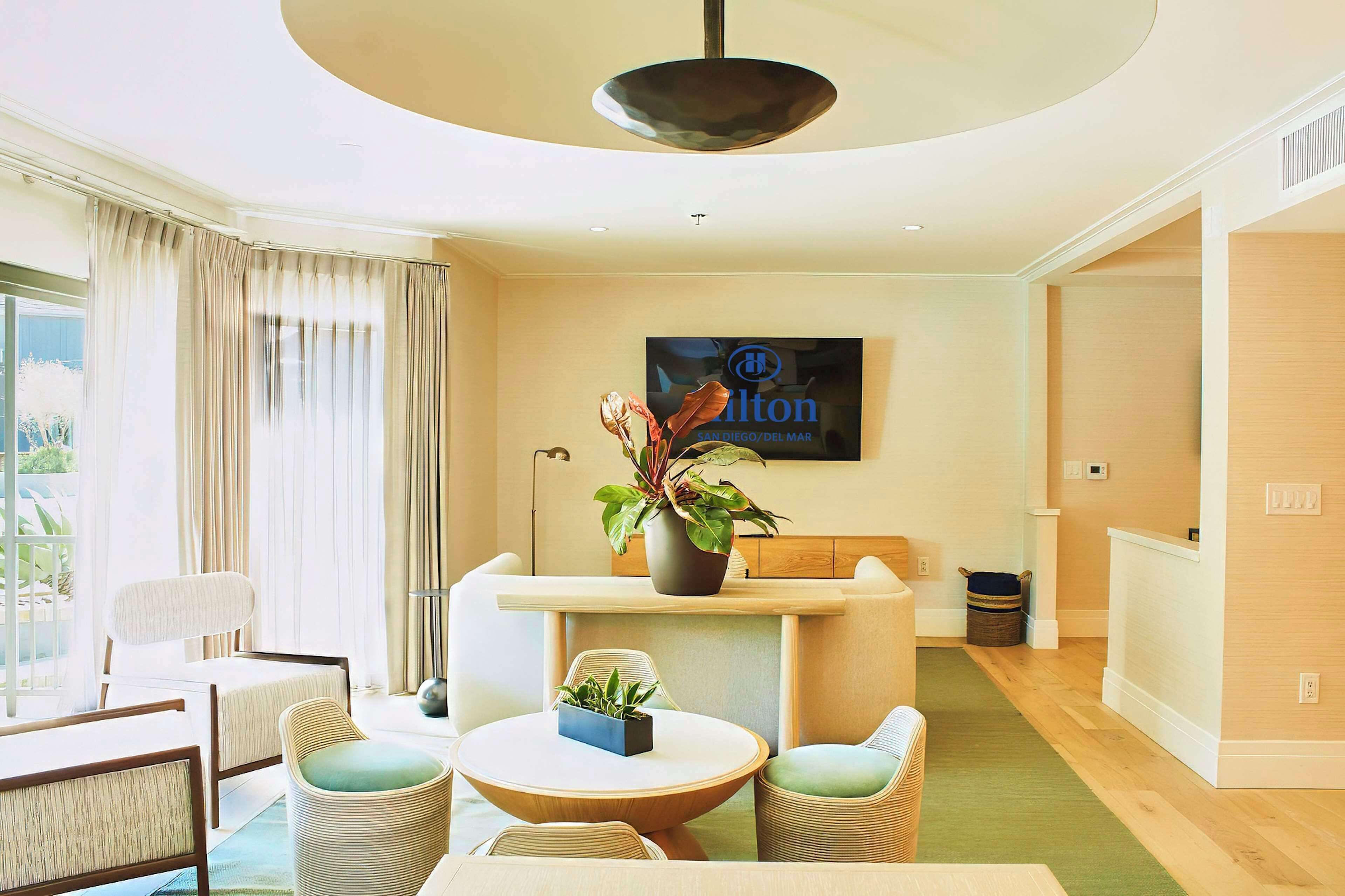 suite, 1 king bed, patio | premium bedding, down duvets, in-room safe, desk