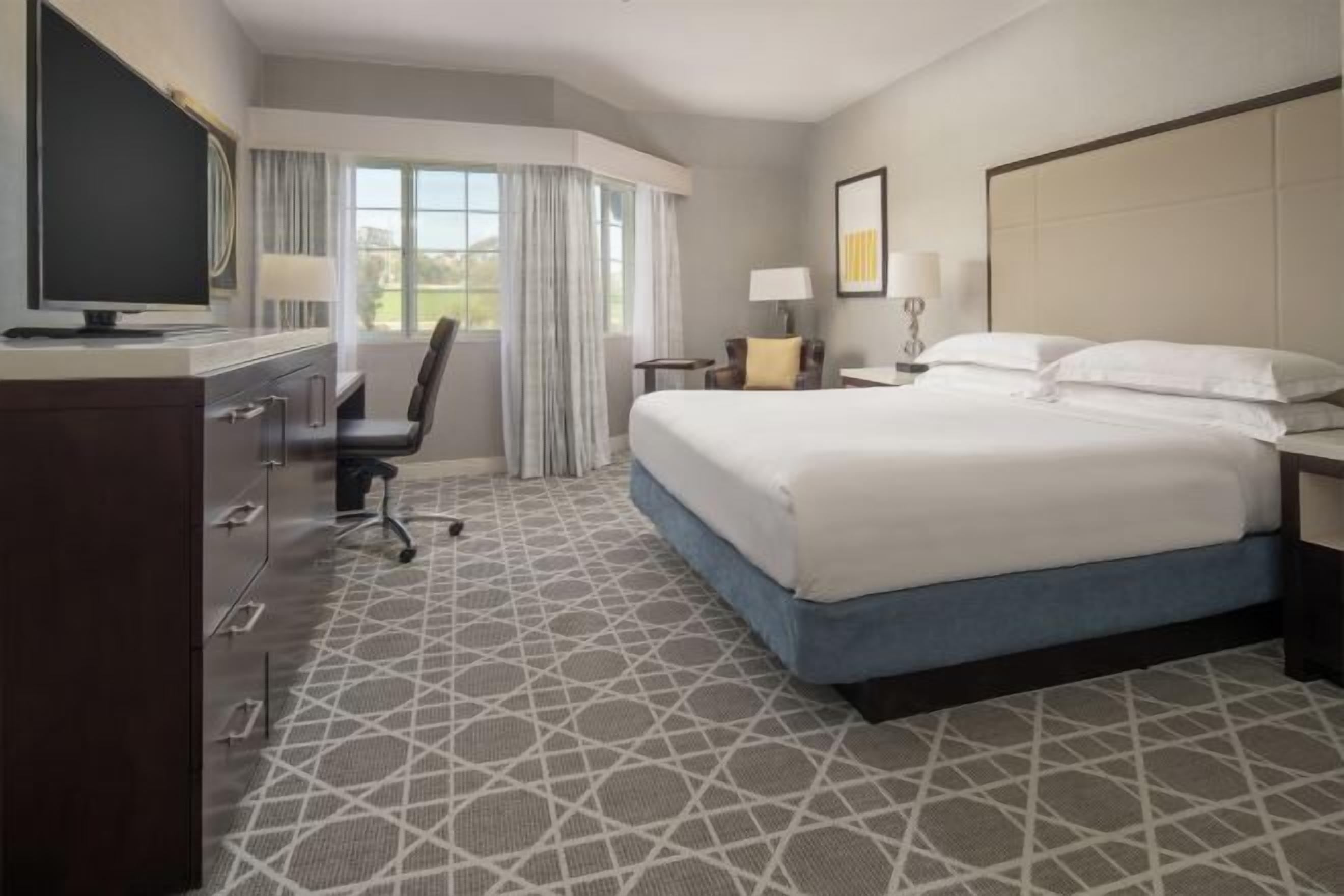 Premium bedding, down comforters, in-room safe, desk