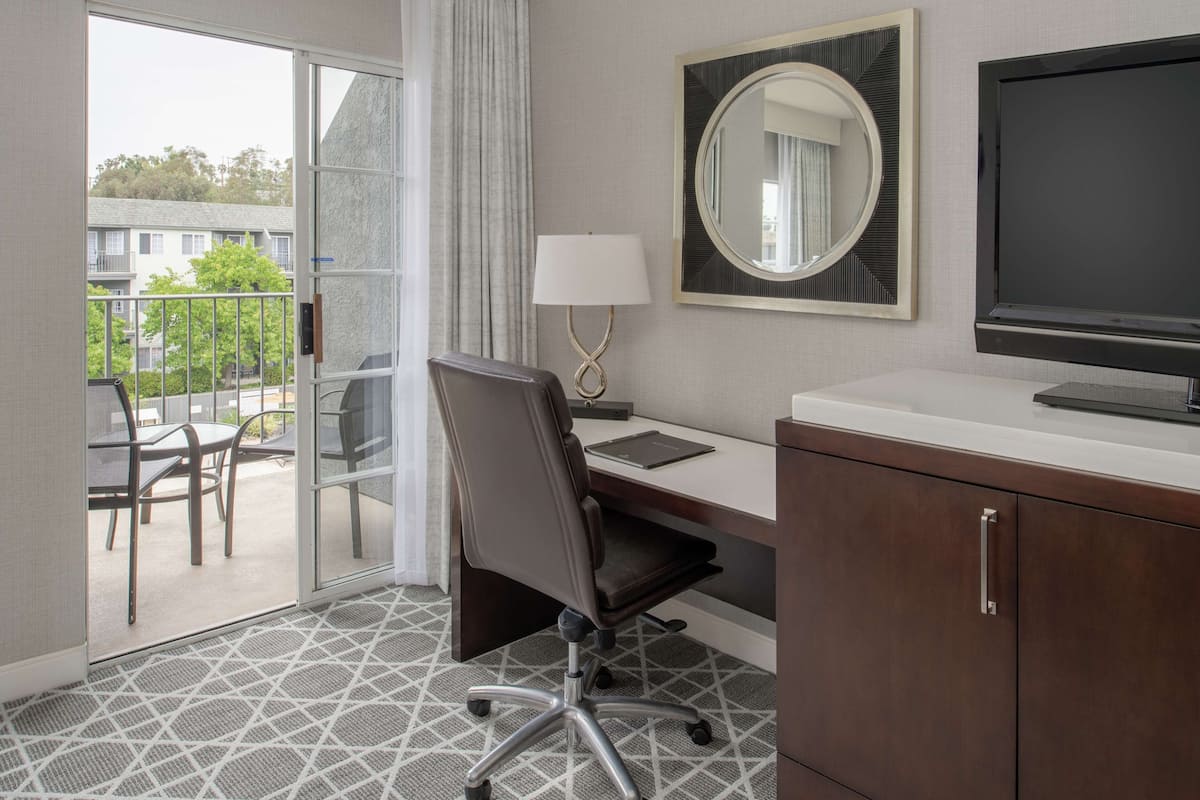 Premium bedding, down comforters, in-room safe, desk