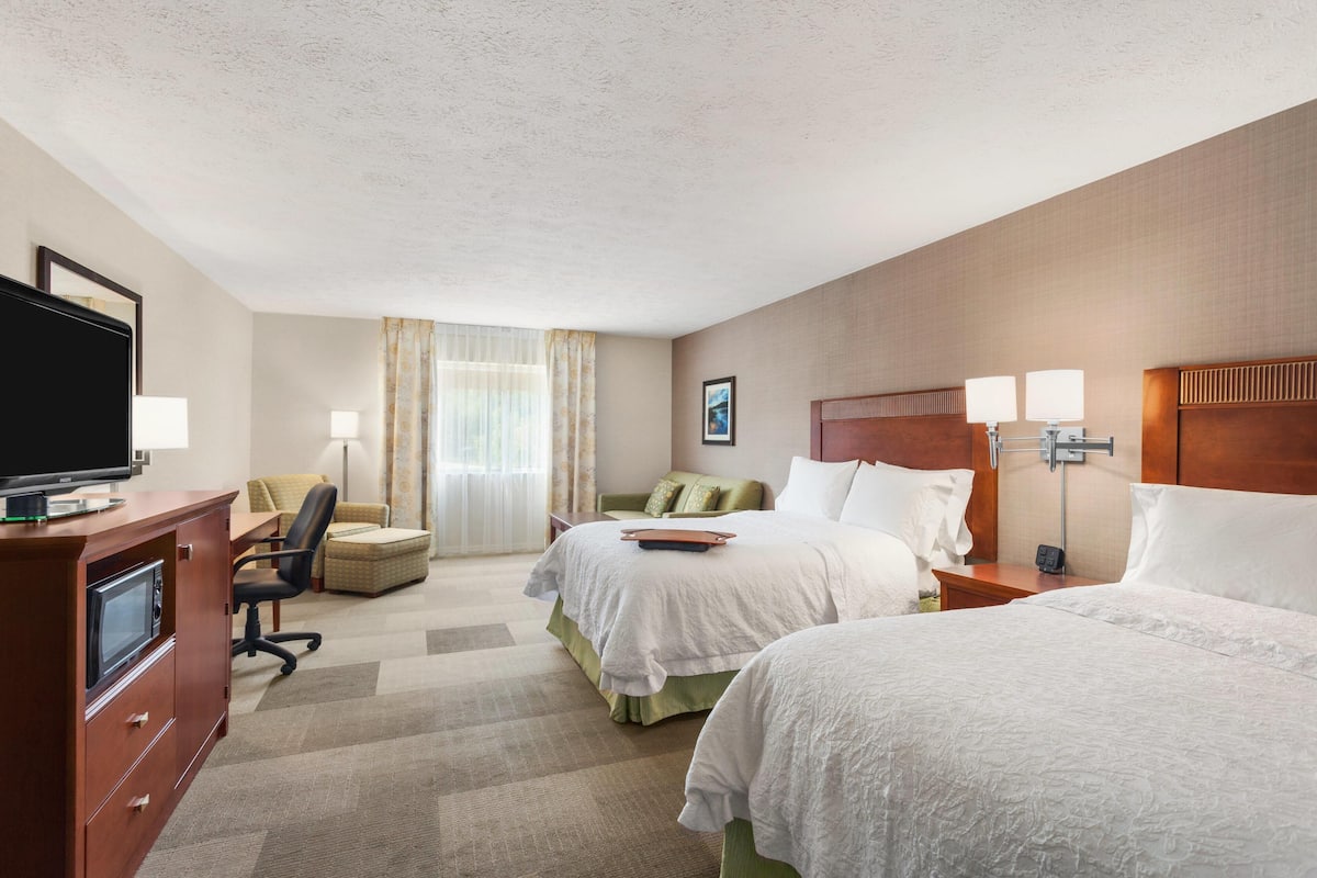 Family Suite, 2 Double Beds | Hypo-allergenic bedding, desk, laptop workspace, blackout drapes