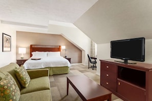 Hypo-allergenic bedding, desk, laptop workspace, blackout curtains