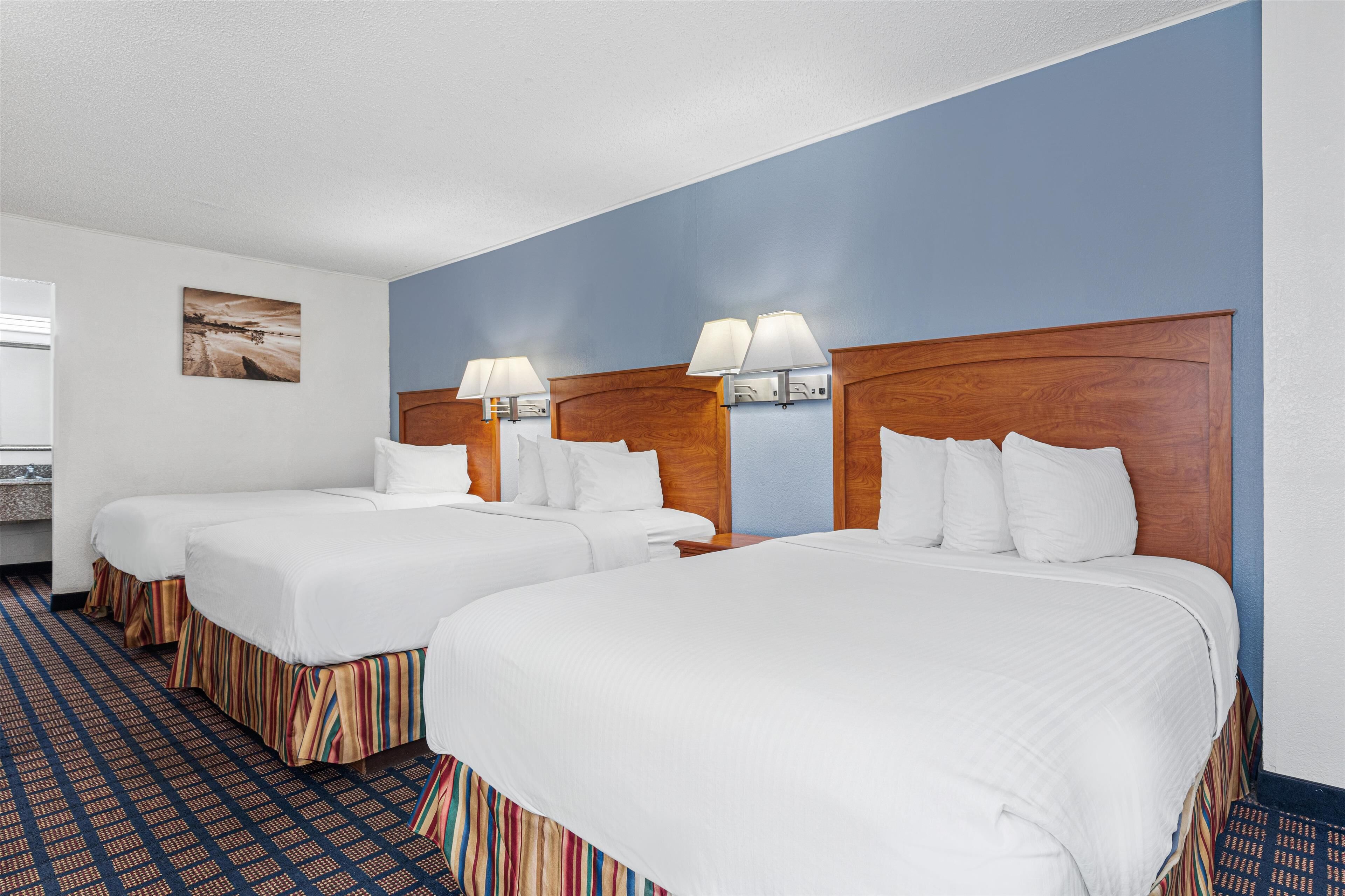 standard room, multiple beds, non smoking, refrigerator & microwave | 1 bedroom, in-room safe, desk, laptop workspace