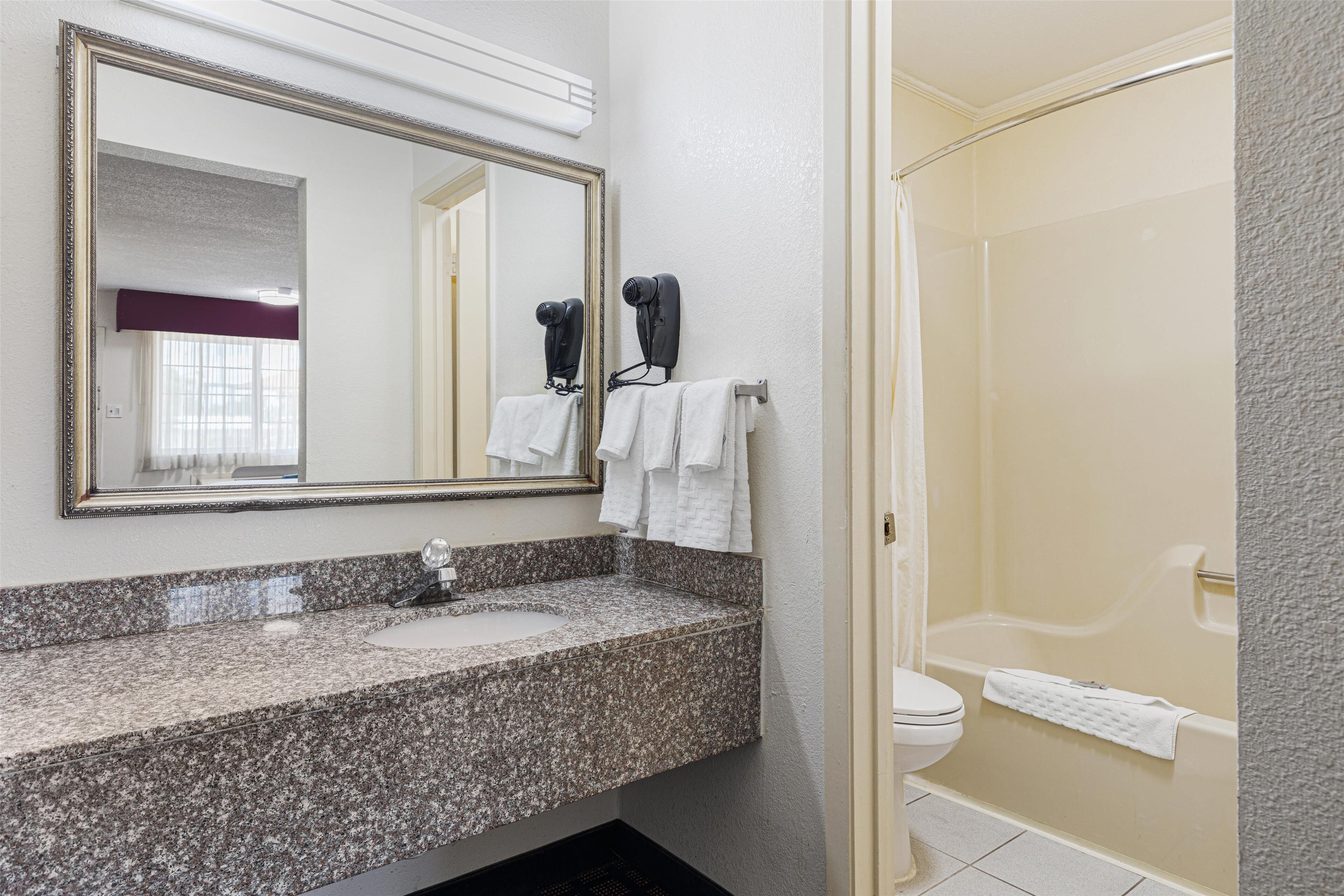 rainfall showerhead, free toiletries, hair dryer, towels