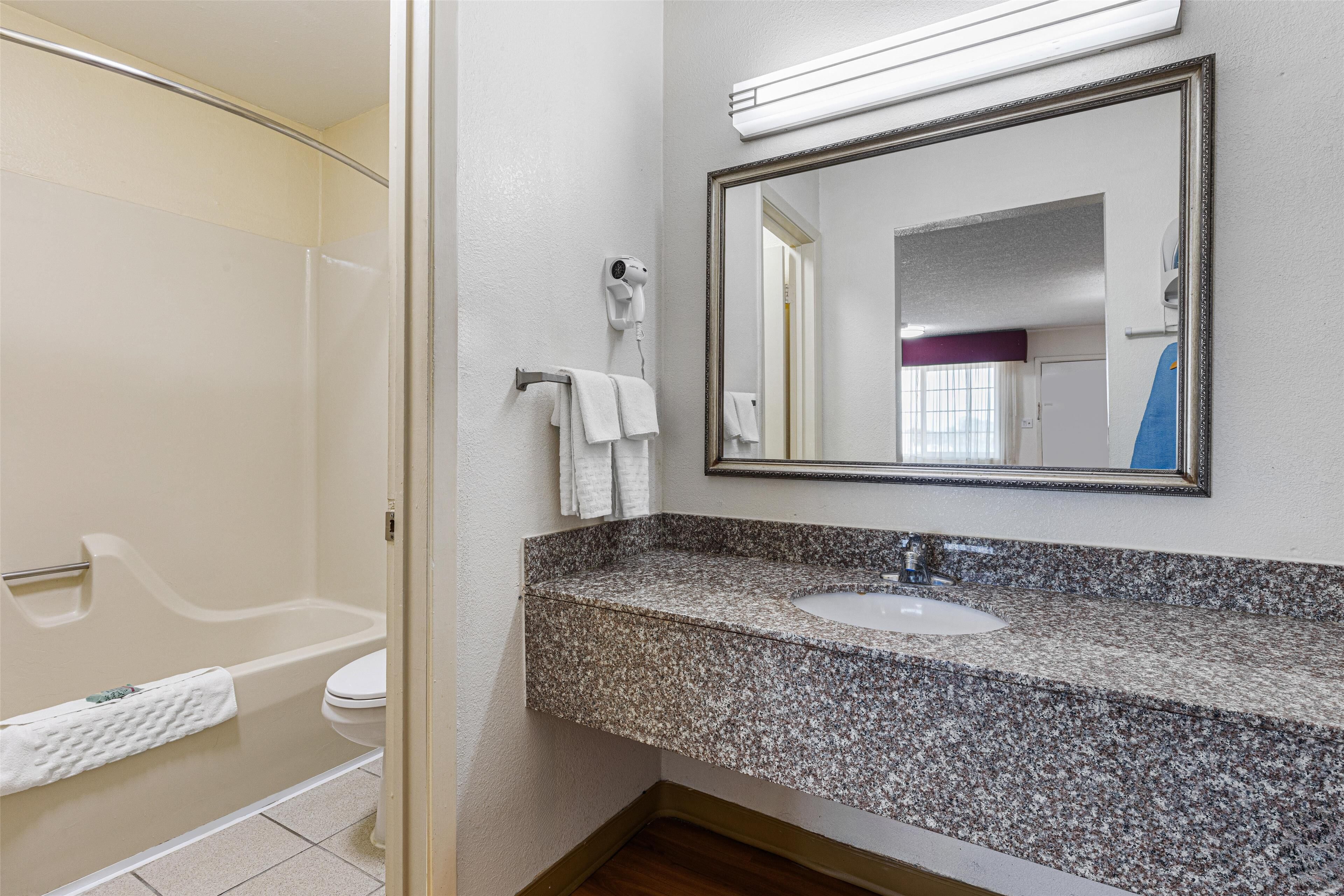 rainfall showerhead, free toiletries, hair dryer, towels