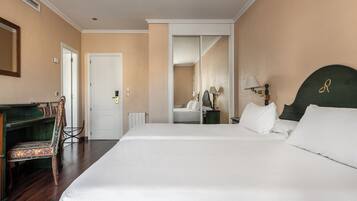 Hypo-allergenic bedding, minibar, in-room safe, desk