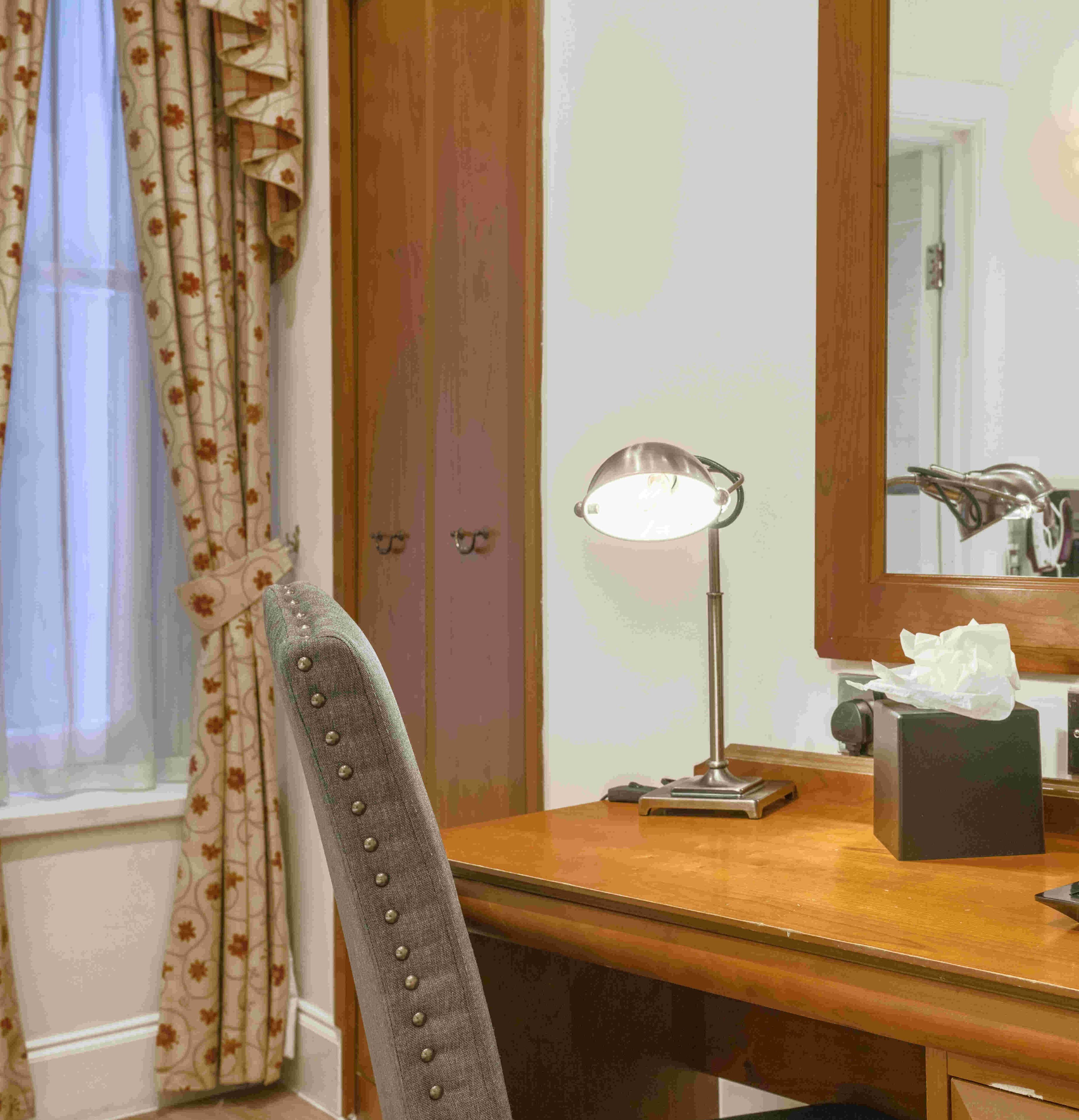 junior double room, 1 double bed, non smoking, no windows | desk, iron/ironing board, free wifi, bed sheets