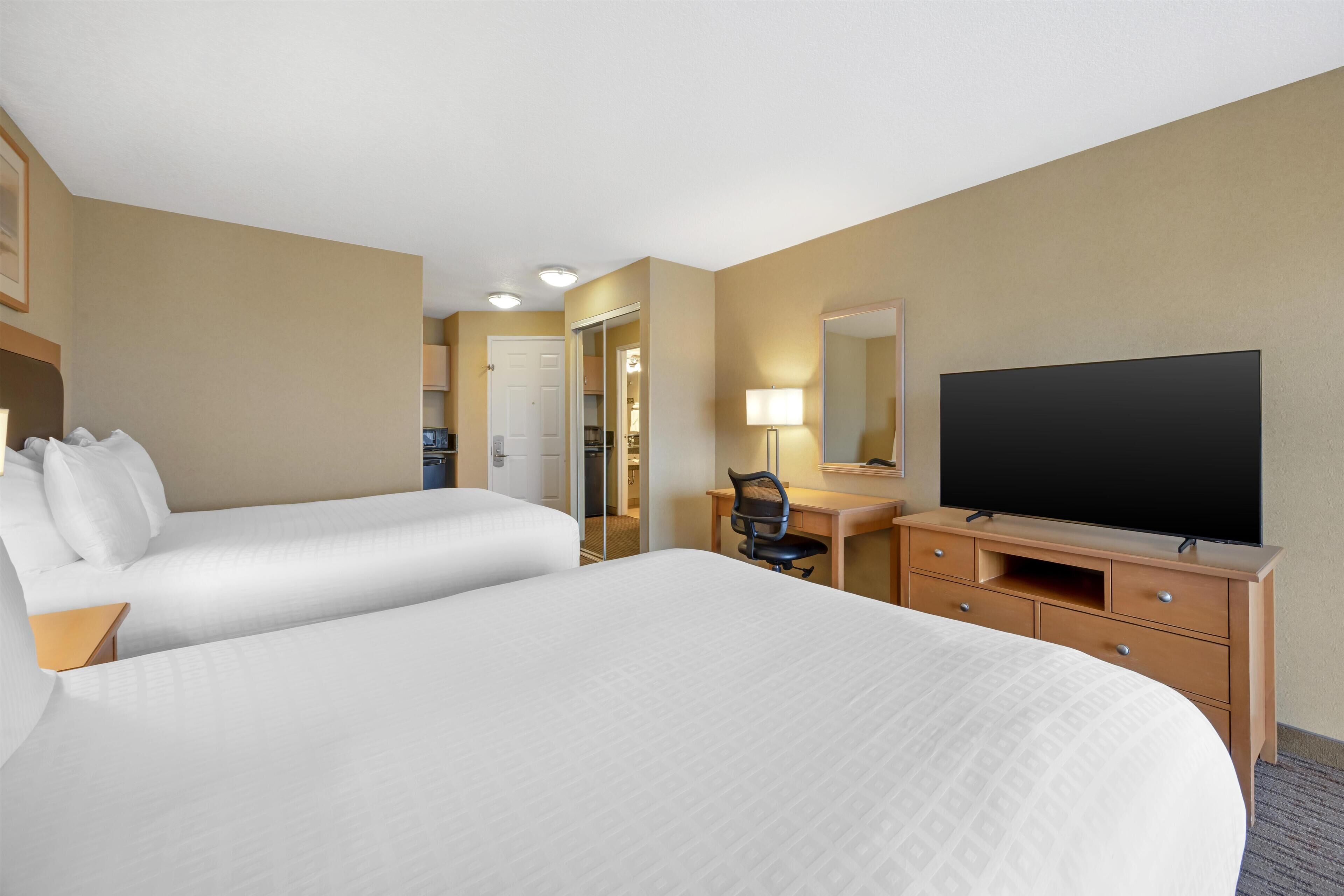 Pillowtop beds, in-room safe, blackout drapes, iron/ironing board