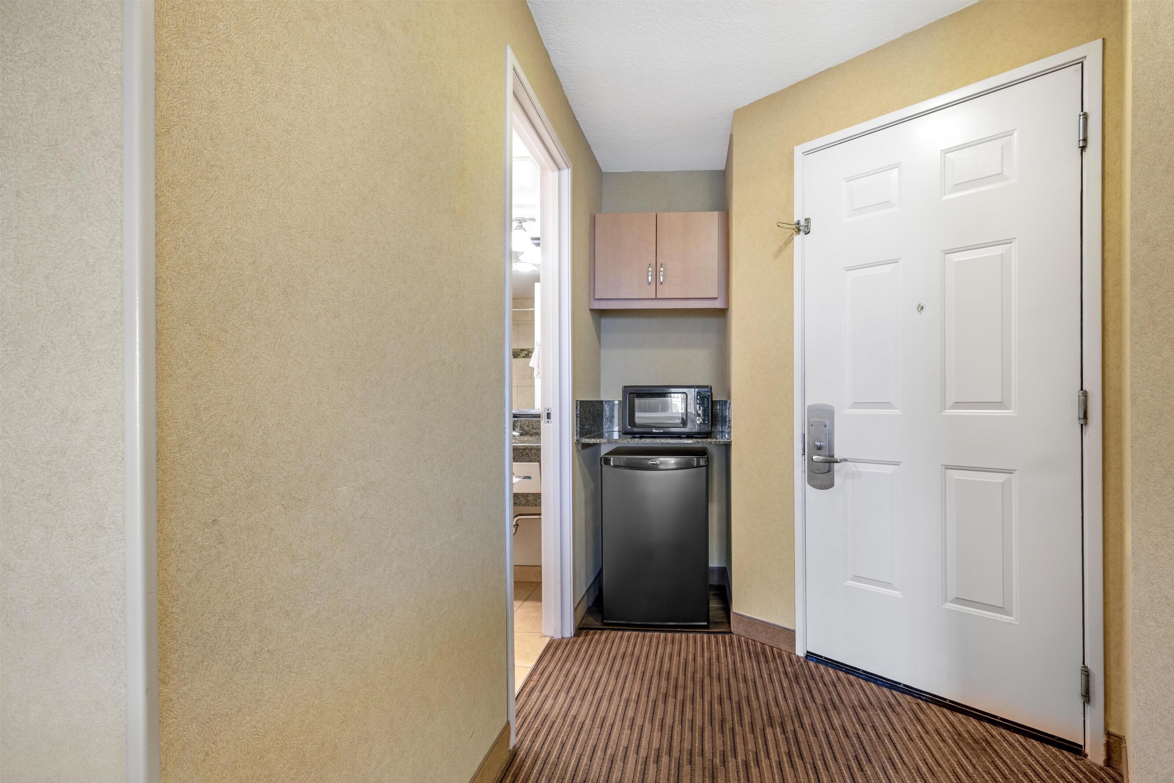 Standard Room, 2 Queen Beds, Balcony, Partial Ocean View | Pillowtop beds, in-room safe, blackout drapes, iron/ironing board