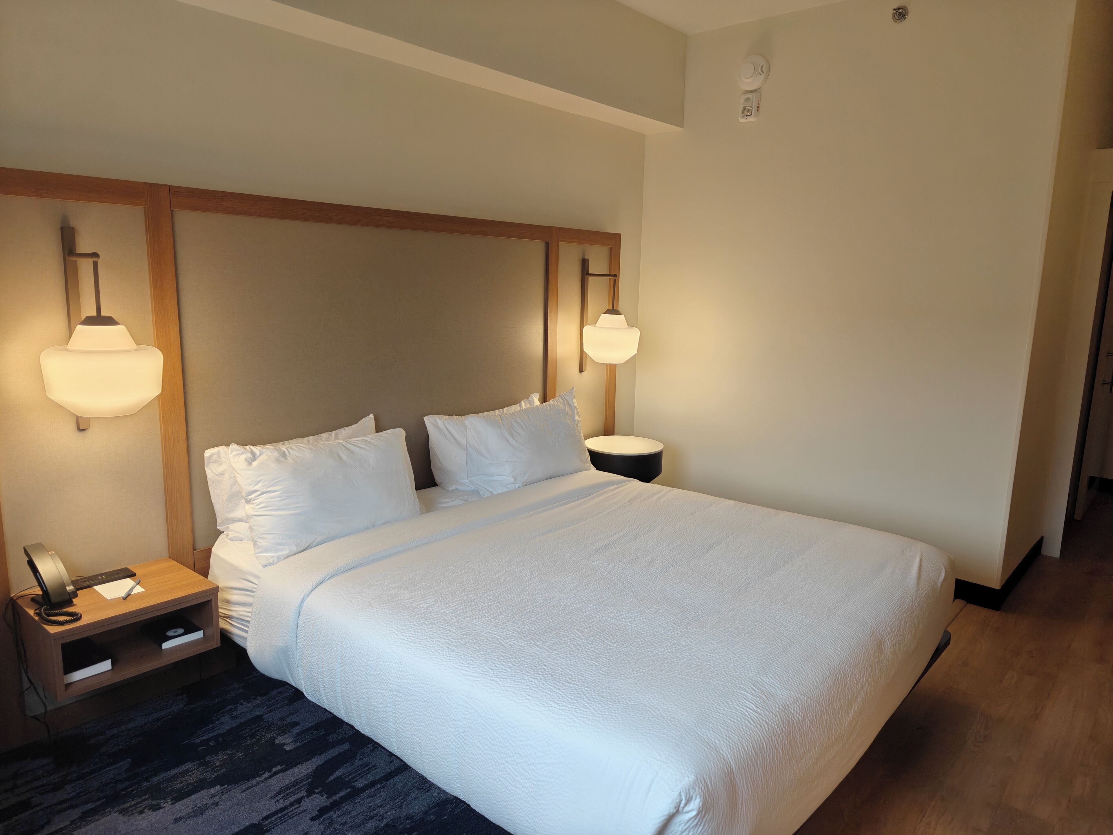 Desk, laptop workspace, blackout drapes, iron/ironing board