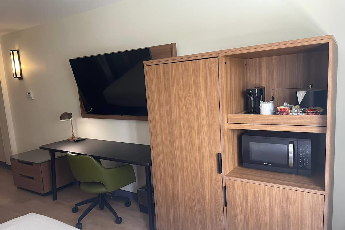 Desk, laptop workspace, blackout curtains, iron/ironing board