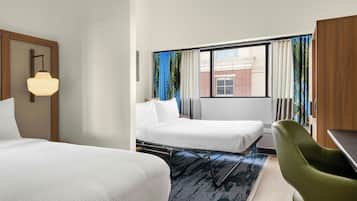 Desk, laptop workspace, blackout drapes, iron/ironing board