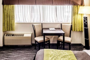 Desk, laptop workspace, blackout curtains, iron/ironing board
