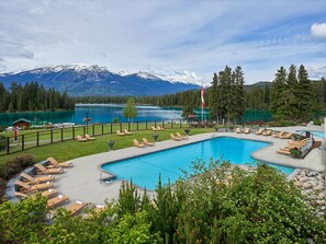 Outdoor pool, open 8:00 AM to 10:00 PM, pool umbrellas, pool loungers