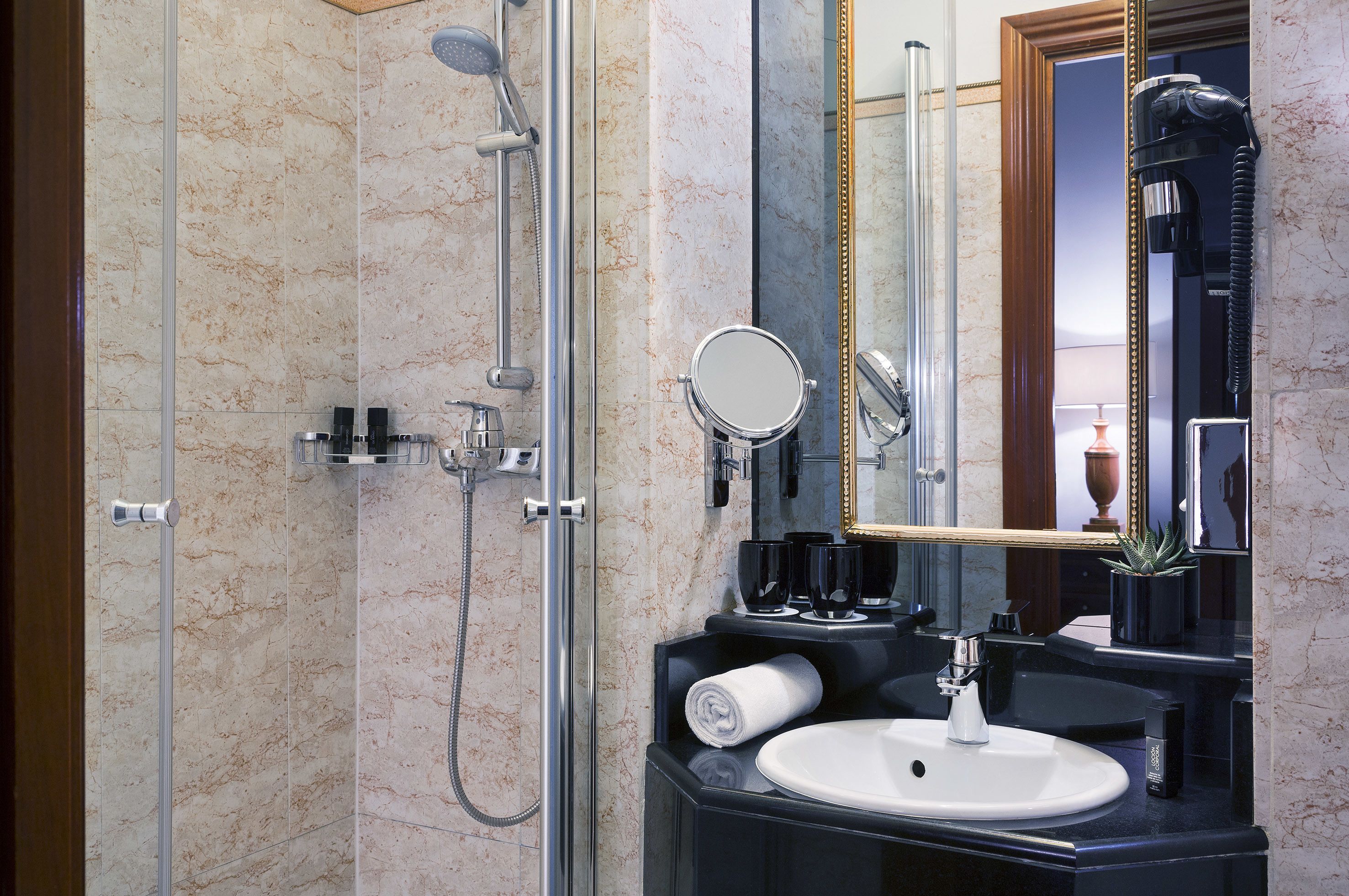 deep-soaking bathtub, eco-friendly toiletries, hair dryer, towels