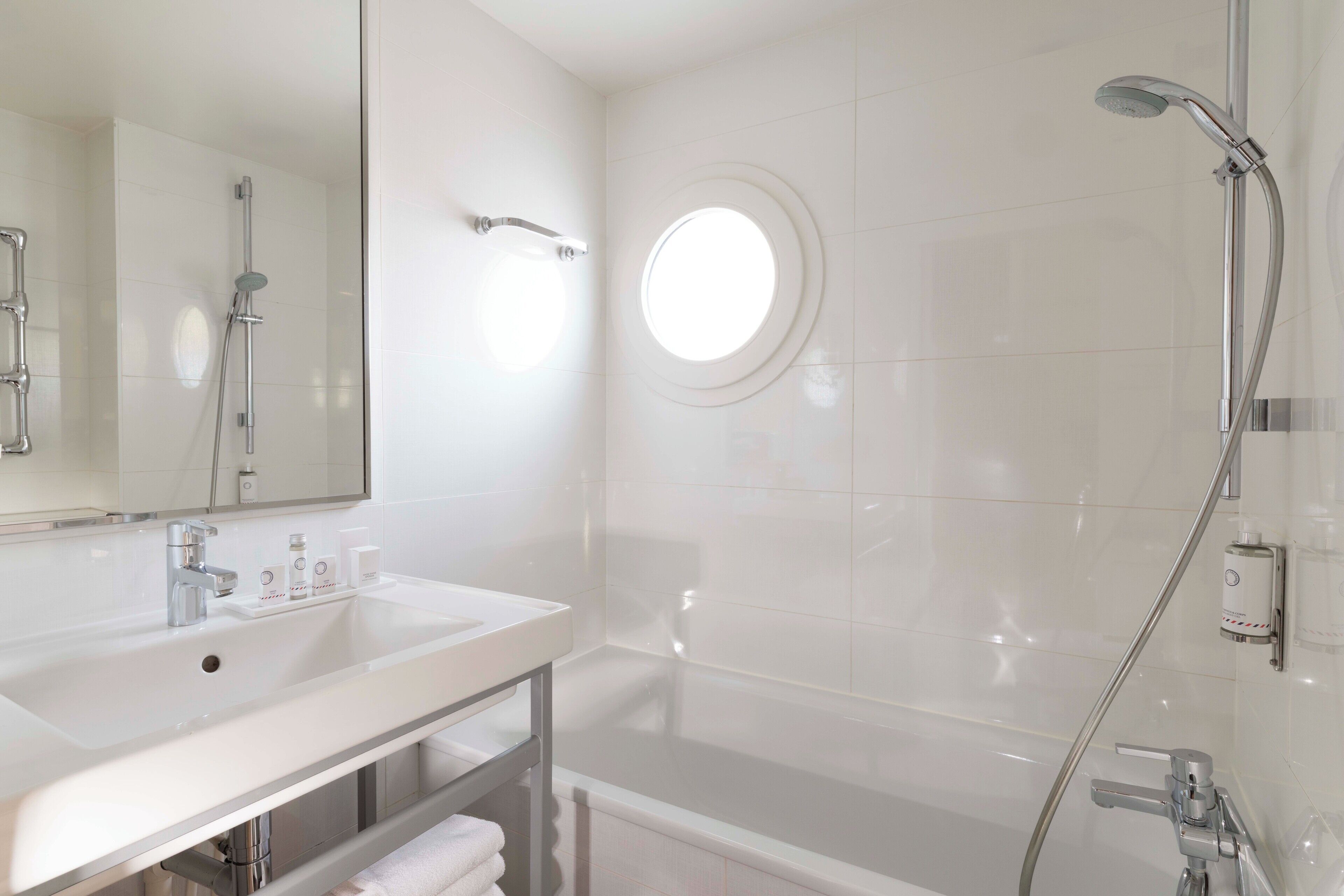 premium double room | bathroom | hair dryer, towels, soap, shampoo