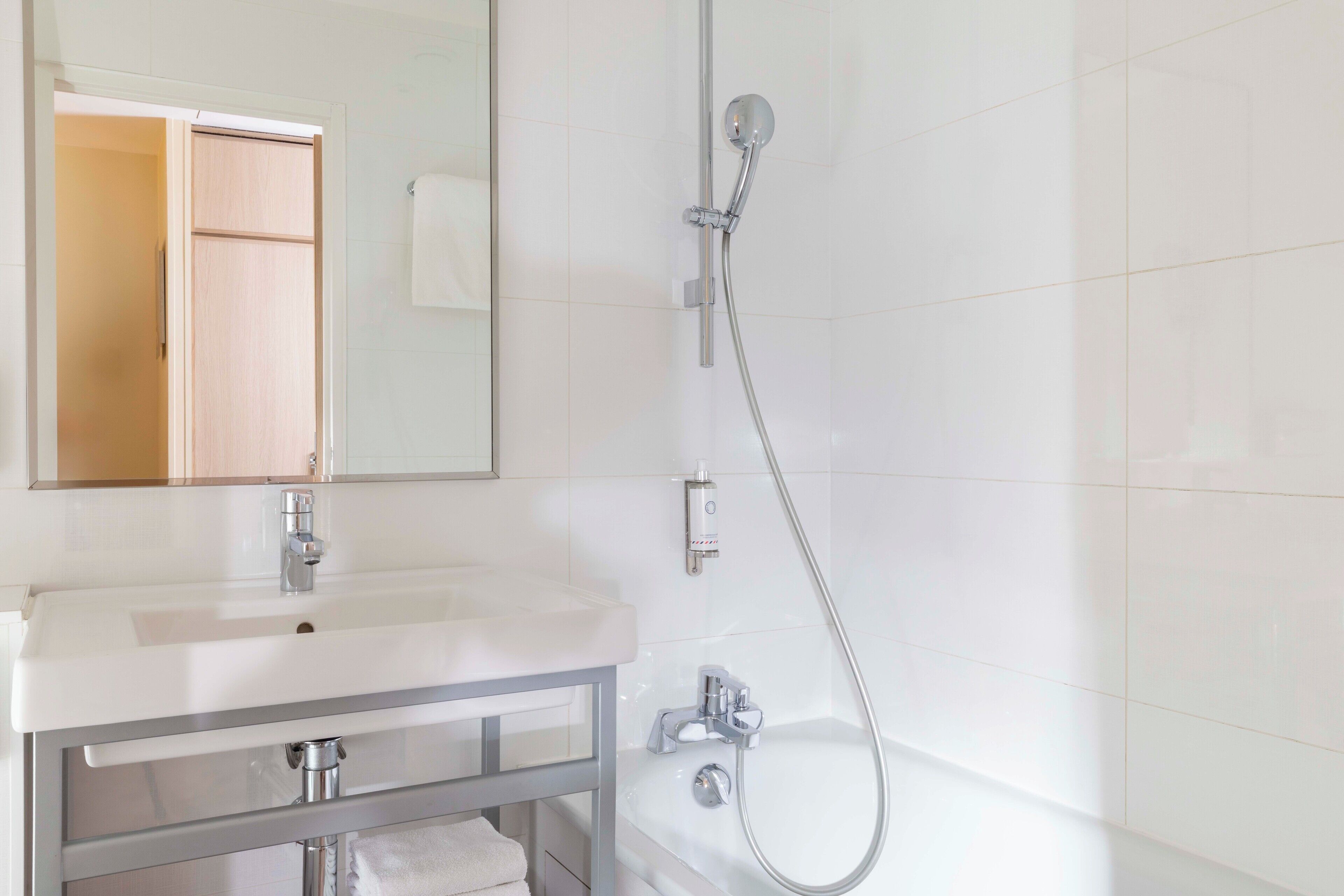 hair dryer, towels, soap, shampoo