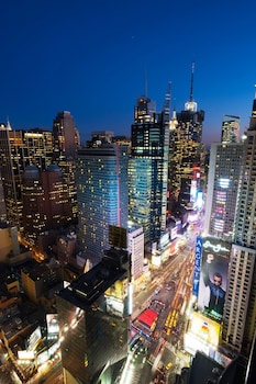 Hotel room view looking out at Crowne Plaza Times Square Manhattan, an IHG Hotel