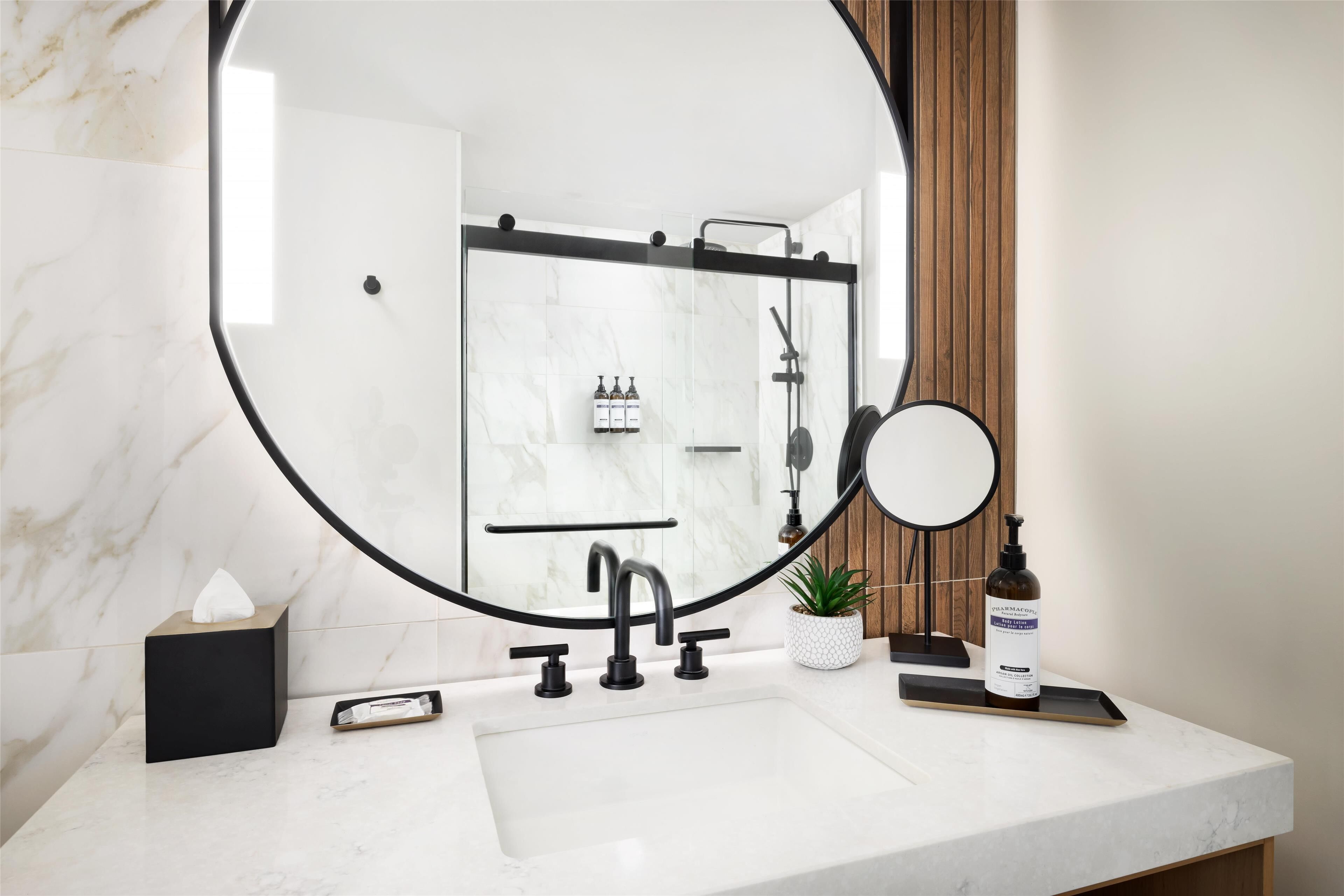 designer toiletries, hair dryer, towels, soap